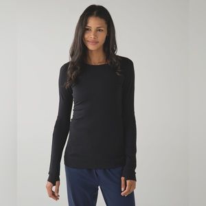 Lululemon &go On The Go Long Sleeve 
in Black. 
Size 4. 
Pristine Condition.